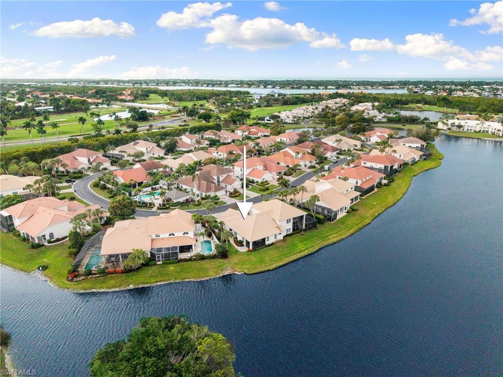 2153 Paget Circle Naples, FL 34112 - Photo 45 of 49 Aerial view of residential area with a large body of water