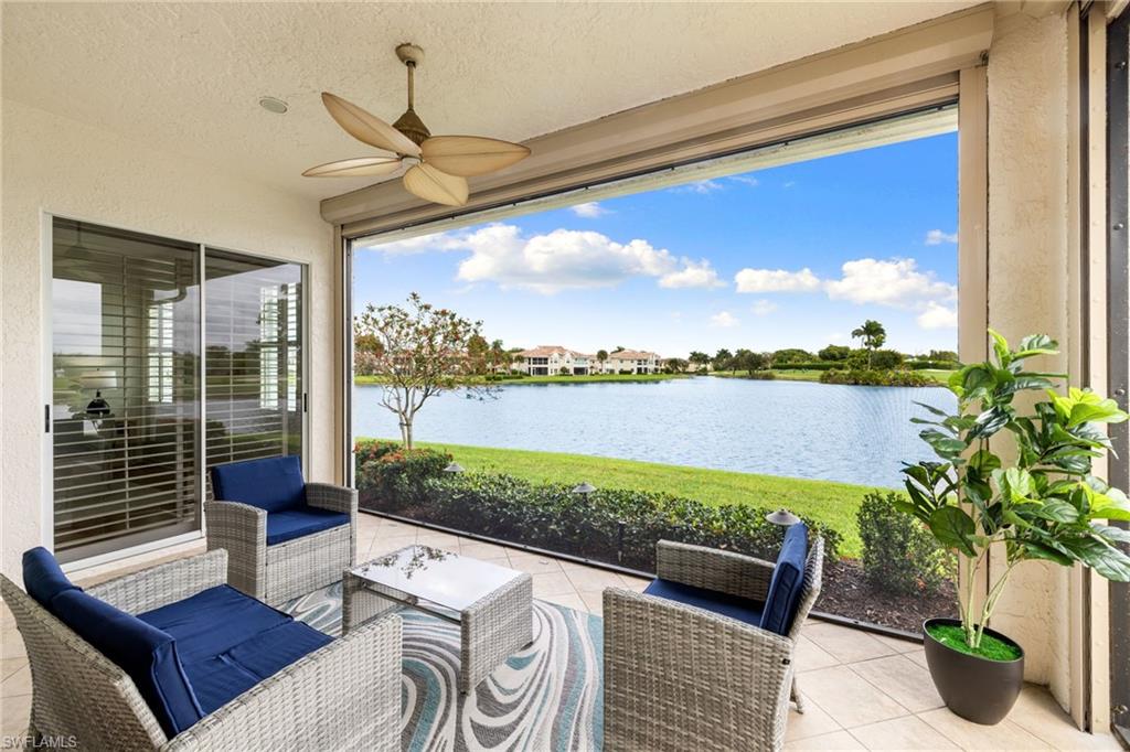 2153 Paget Circle Naples, FL 34112 - Photo 6 of 49 View of patio / terrace with a ceiling fan and a water view