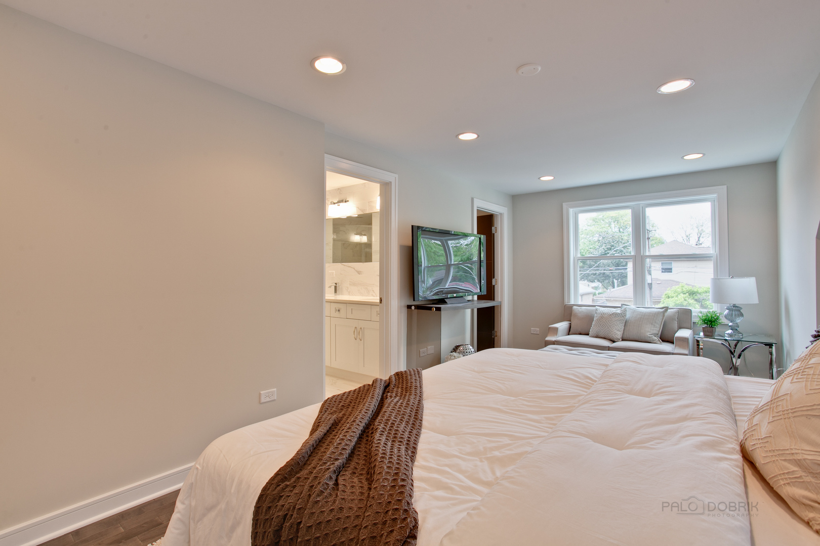 10459 South Troy Street Chicago, IL 60655 - Photo 12 of 24 a bedroom with a bed and large windows