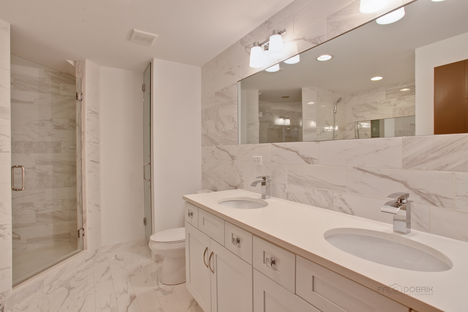 10459 South Troy Street Chicago, IL 60655 - Photo 13 of 24 a bathroom with a sink double vanity and a shower