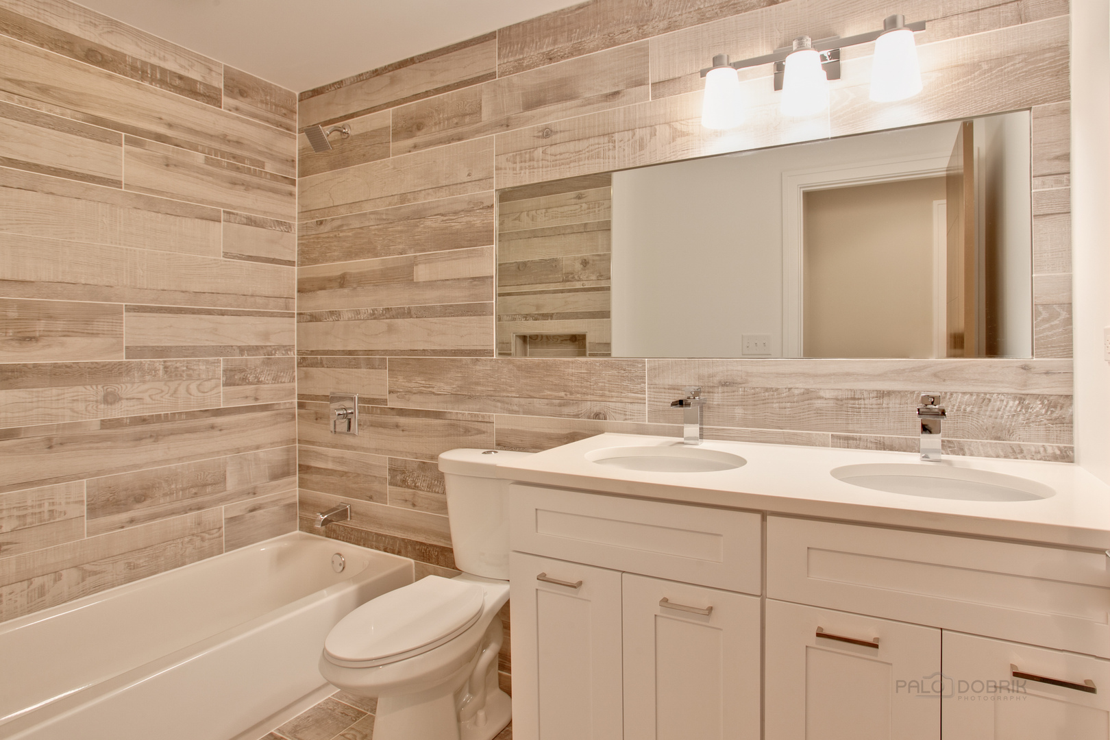 10459 South Troy Street Chicago, IL 60655 - Photo 17 of 24 a bathroom with a sink a toilet and shower