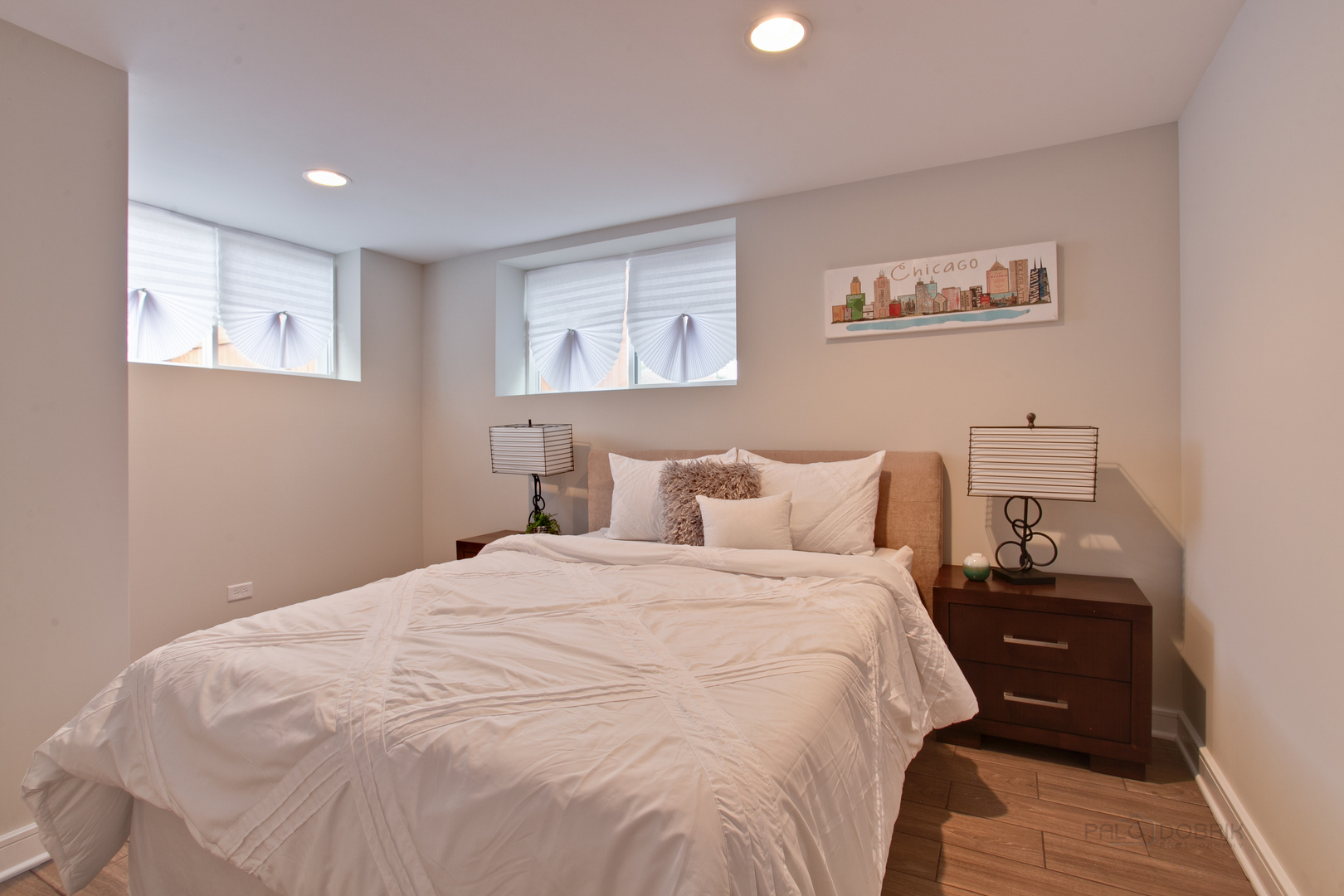 10459 South Troy Street Chicago, IL 60655 - Photo 18 of 24 a bedroom with a bed and a night stand