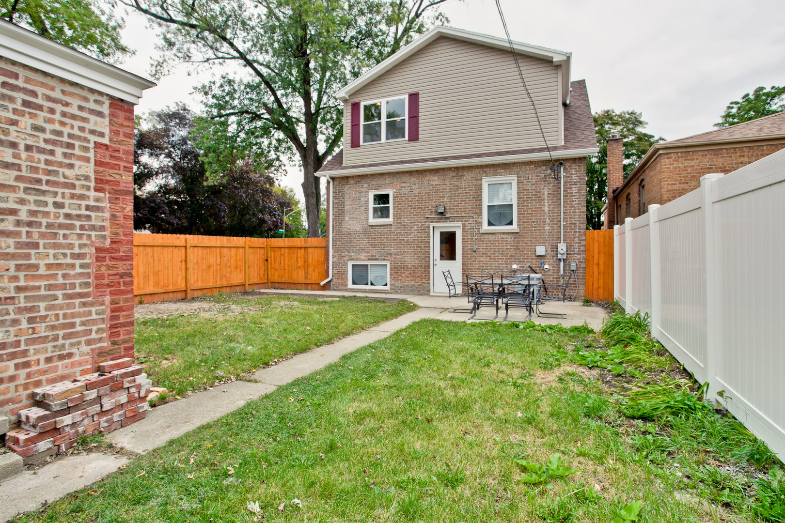 10459 South Troy Street Chicago, IL 60655 - Photo 24 of 24 a view of a house with backyard tub and sitting area