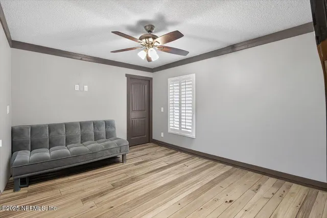a kitchen with stainless steel appliances a stove and a refrigerator