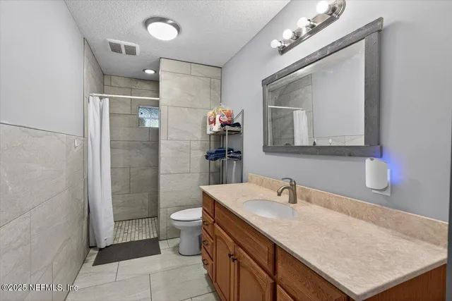 a dining room with furniture and a table