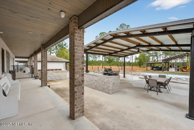 a view of a house with swimming pool