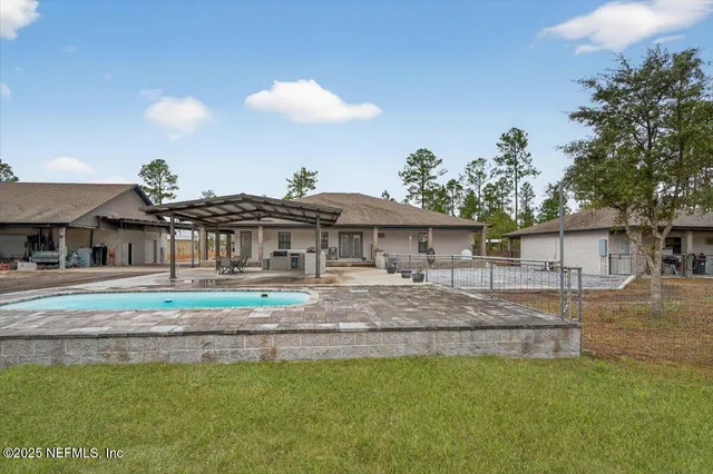 a view of a house with swimming pool