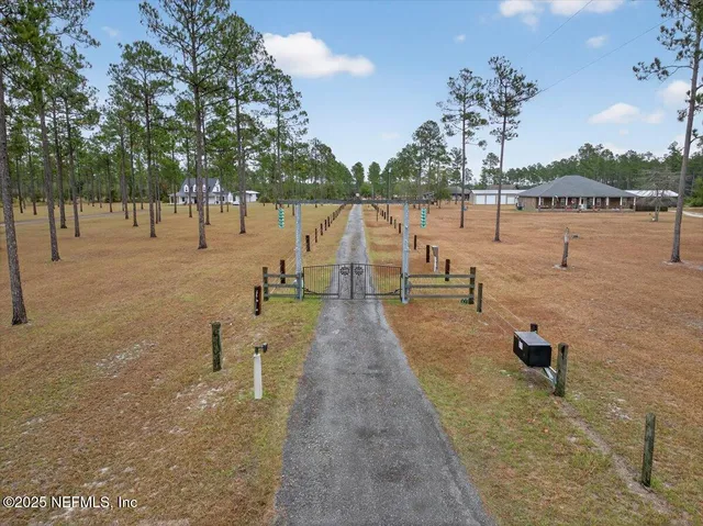 a view of a lake with trees