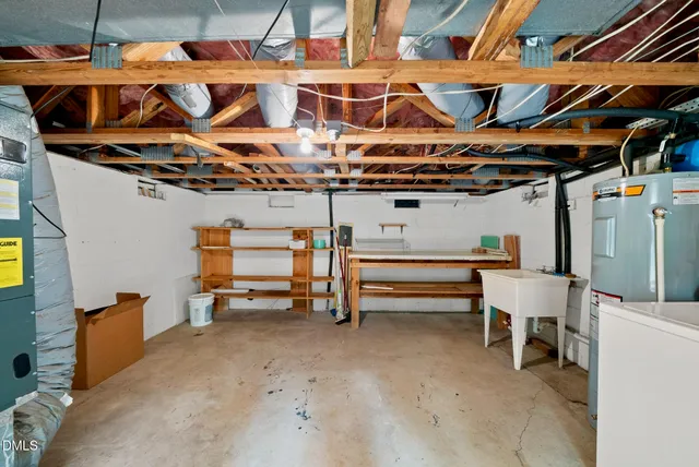 a view of a patio with table and chairs