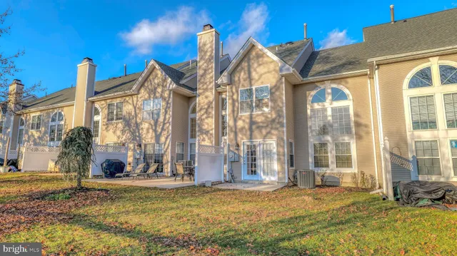 a view of a house with a swimming pool