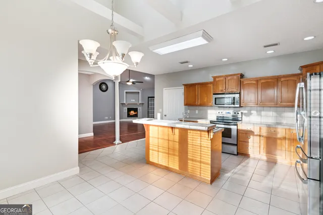 a view of a kitchen with shelf