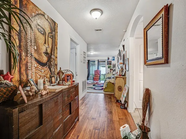 a view of a kitchen with furniture and a window