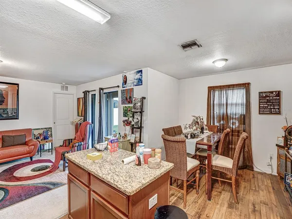 a outdoor space with furniture and wooden floor