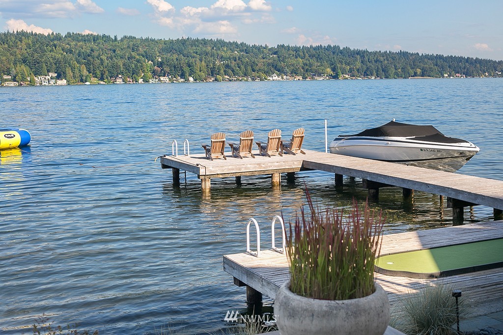 12040 Riviera Place Northeast Seattle, WA 98125 - Photo 1 of 1 a view of a lake from a balcony