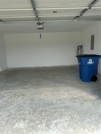 a white toilet sitting next to a bath tub