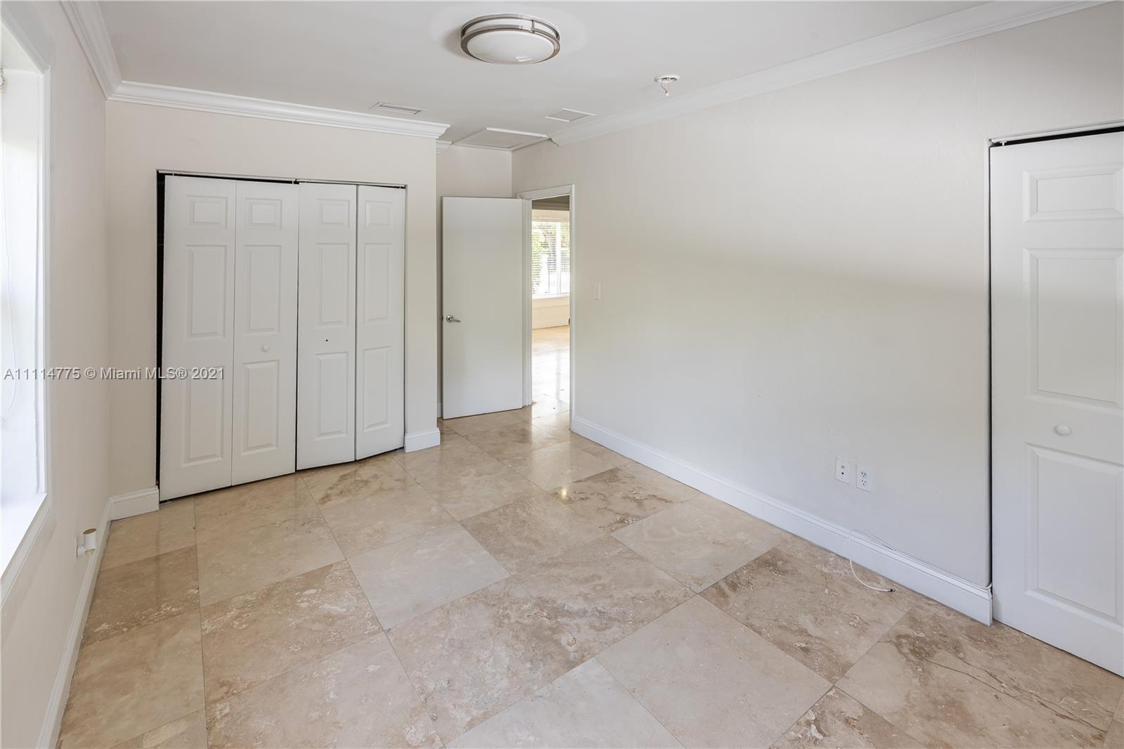 135 Southwest 22nd Road Miami, FL 33129 - Photo 23 of 44 a view of an empty room