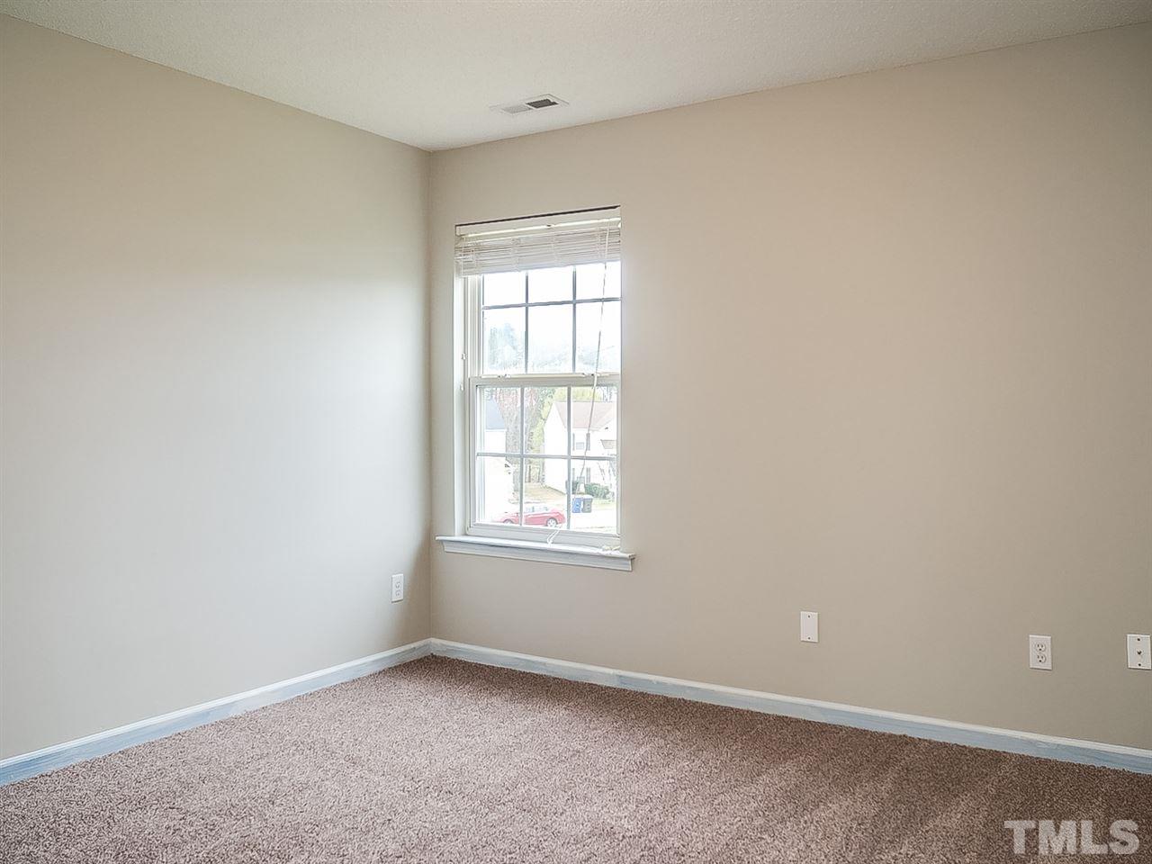 7416 Lowell Ridge Road Raleigh, NC 27616 - Photo 15 of 26 an empty room with a window