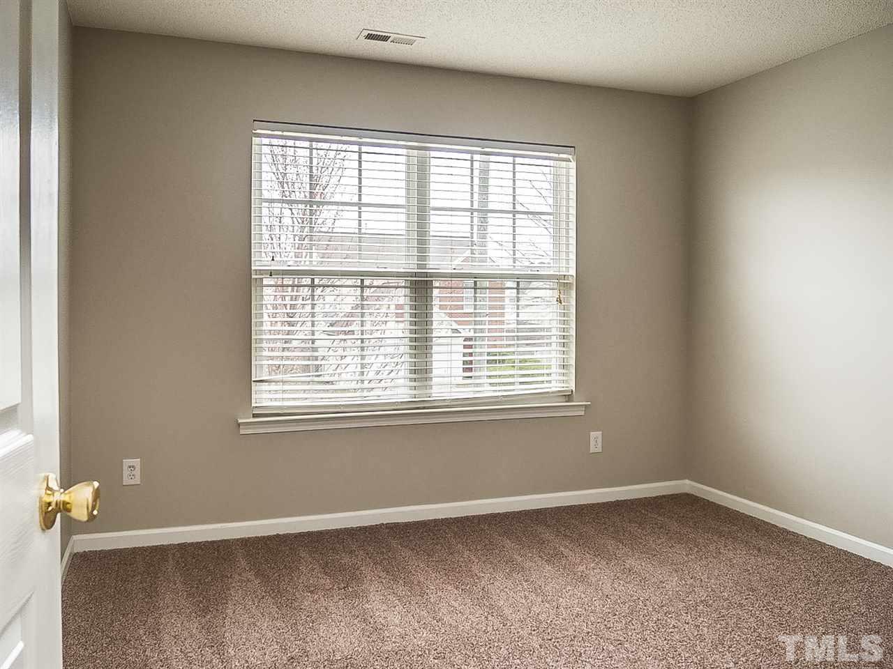 7416 Lowell Ridge Road Raleigh, NC 27616 - Photo 17 of 26 an empty room with a window