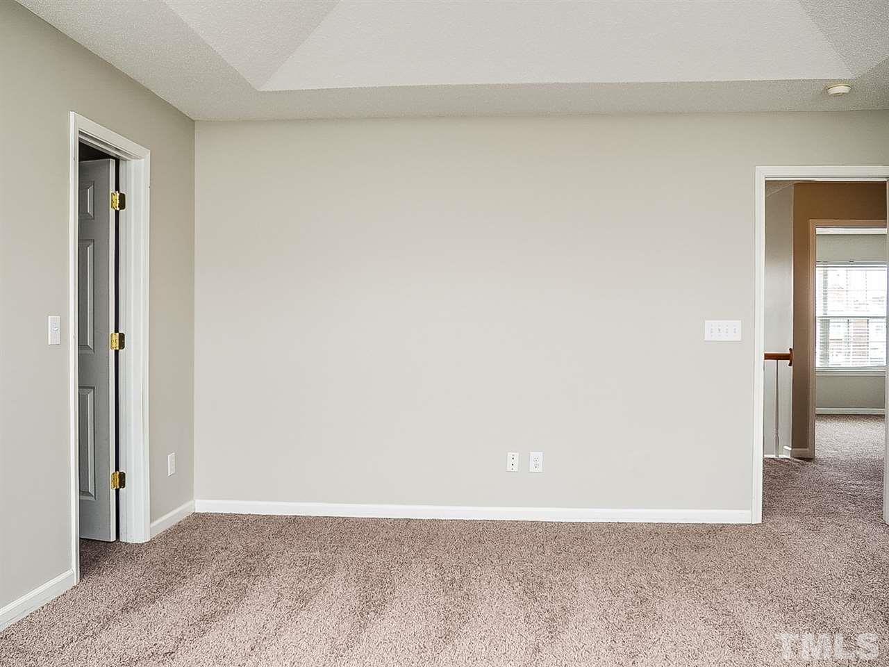 7416 Lowell Ridge Road Raleigh, NC 27616 - Photo 10 of 26 an empty room with windows