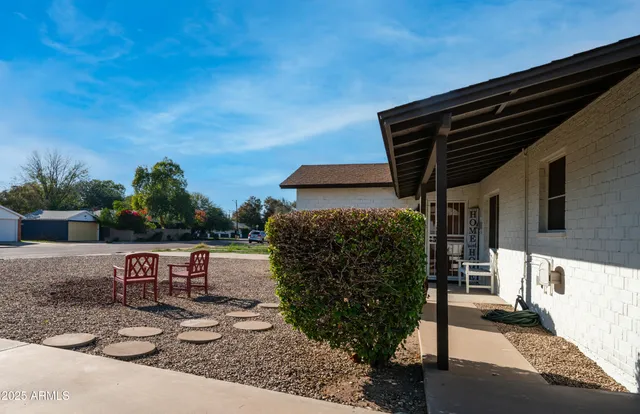a view of a terrace with chairs