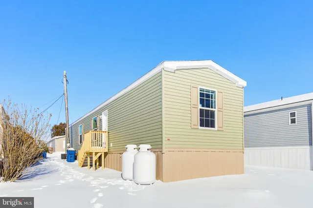 a view of a house with a patio