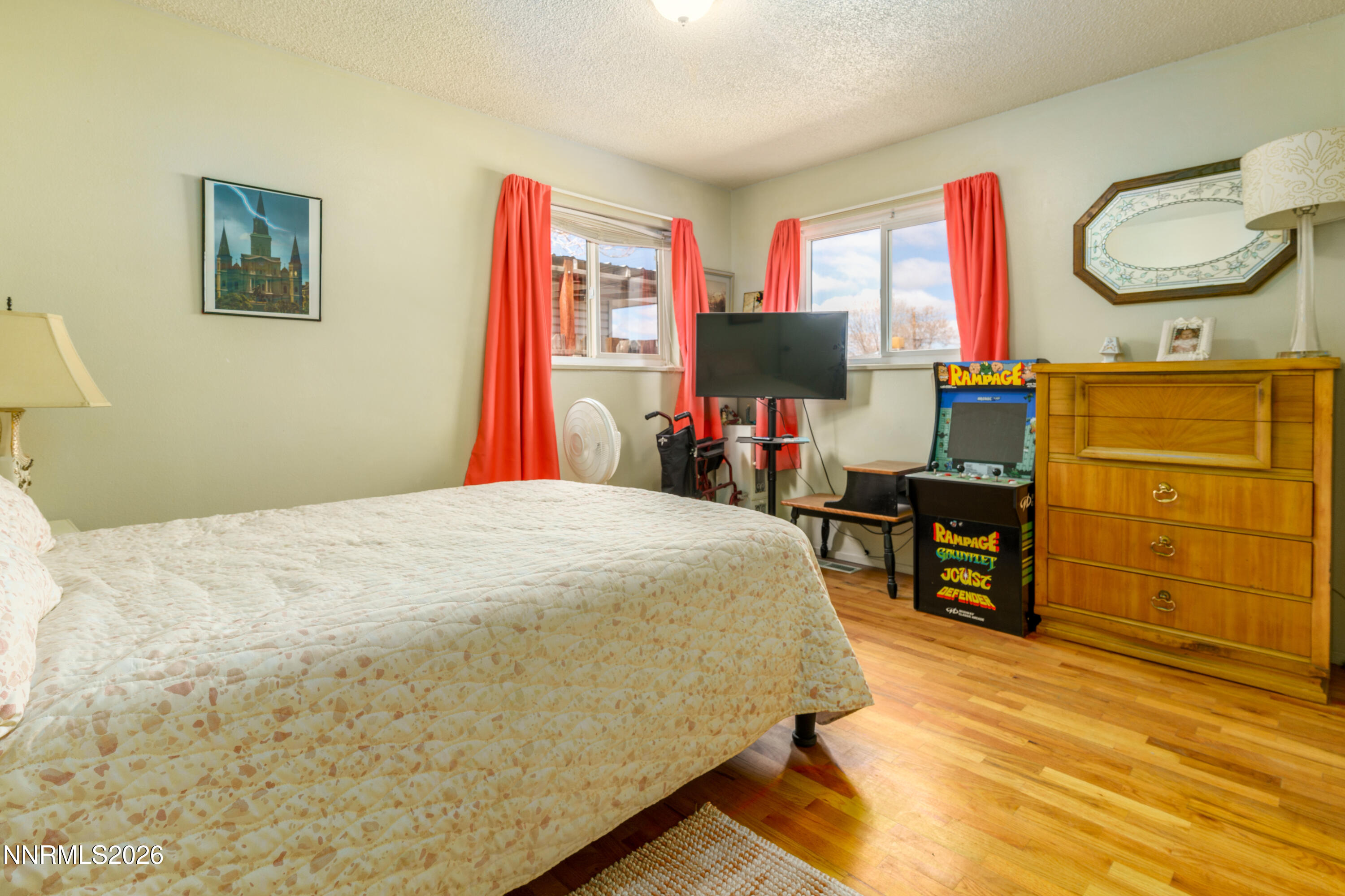 595 Cora Way Fallon, NV 89406 - Photo 16 of 23 a bedroom with a bed and furniture