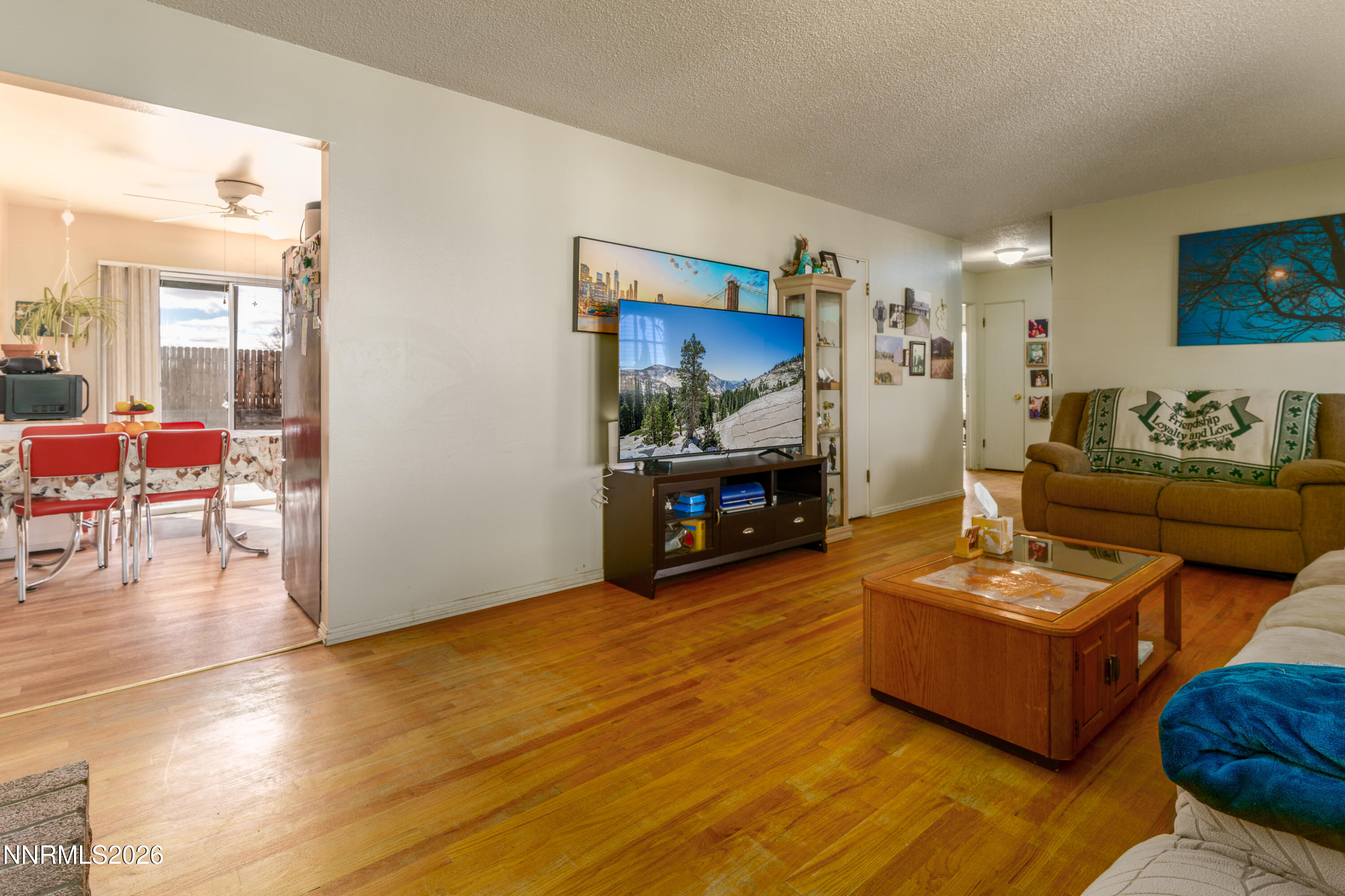 595 Cora Way Fallon, NV 89406 - Photo 8 of 23 a living room with furniture and a wooden floor