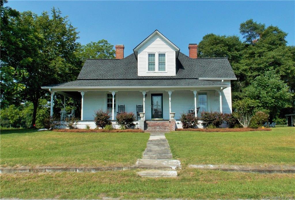 3242 South Potter Road Heath Springs, SC 29058 - Photo 1 of 33 a front view of a house with a yard