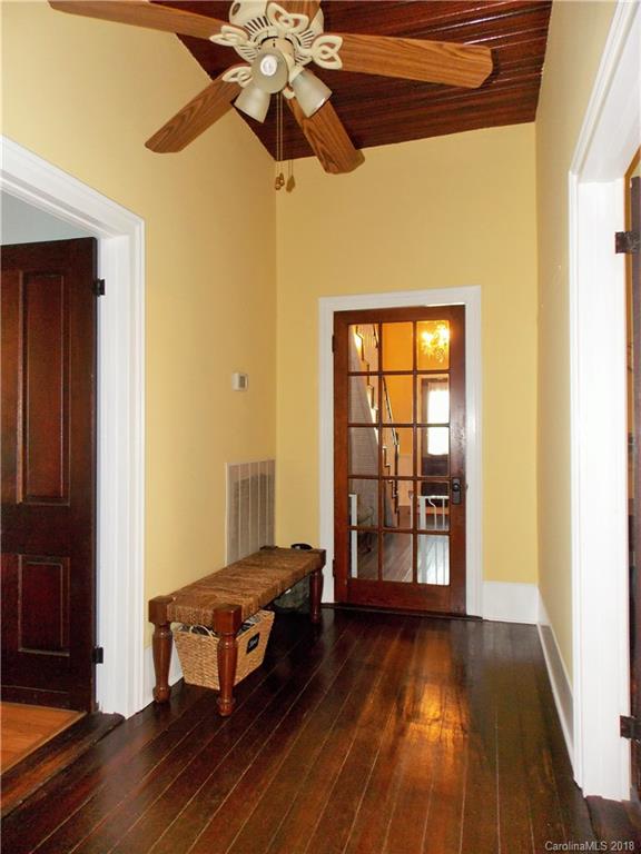 3242 South Potter Road Heath Springs, SC 29058 - Photo 13 of 33 a room with wooden floor and furniture