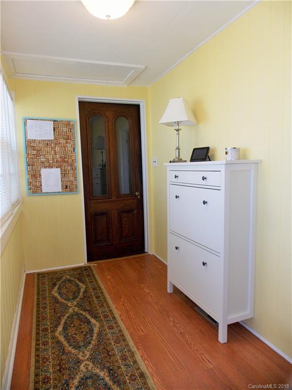 3242 South Potter Road Heath Springs, SC 29058 - Photo 15 of 33 a bedroom with a dresser and a mirror