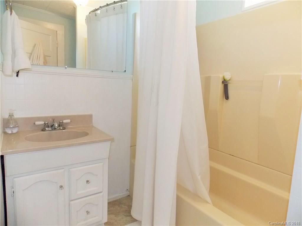 3242 South Potter Road Heath Springs, SC 29058 - Photo 16 of 33 a bathroom with a sink and a mirror