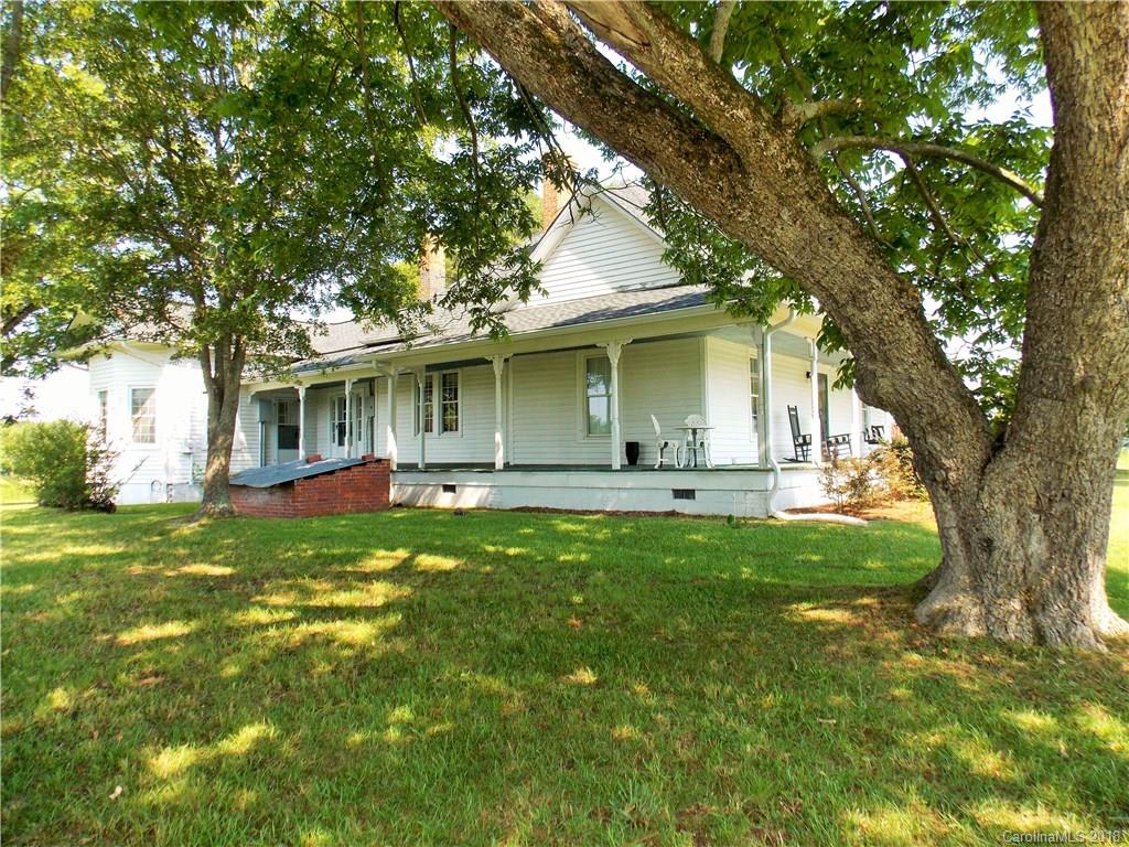 3242 South Potter Road Heath Springs, SC 29058 - Photo 24 of 33 a front view of a house with a garden