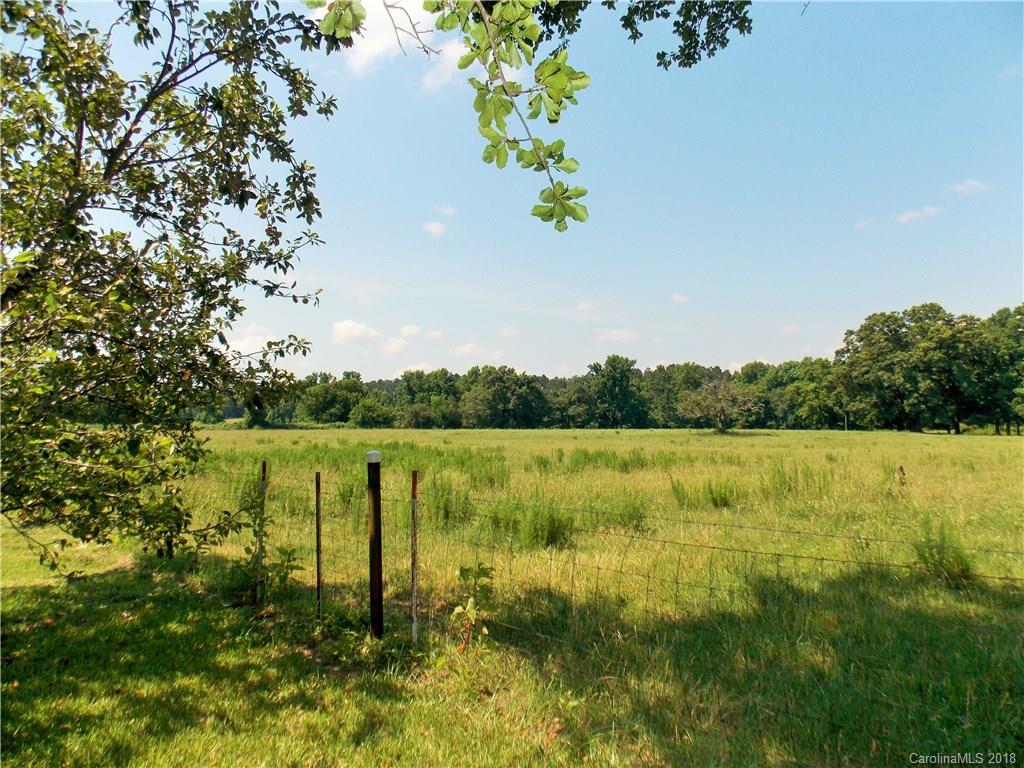 3242 South Potter Road Heath Springs, SC 29058 - Photo 28 of 33 a view of lake with green yard