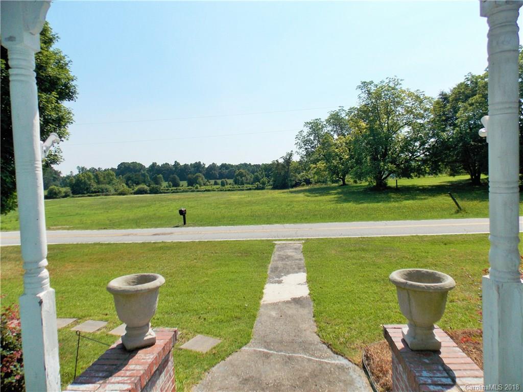 3242 South Potter Road Heath Springs, SC 29058 - Photo 5 of 33 a view of a swimming pool with a yard