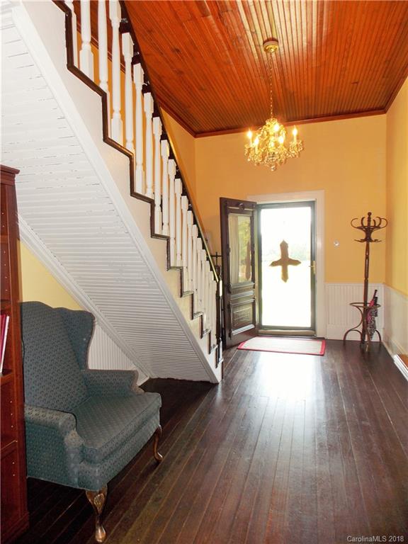3242 South Potter Road Heath Springs, SC 29058 - Photo 7 of 33 a view of entryway and hall with wooden floor