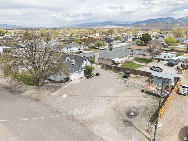 197 West 100 South Redmond, UT 84652 - Photo 33 of 41 Aerial view of residential area with mountains