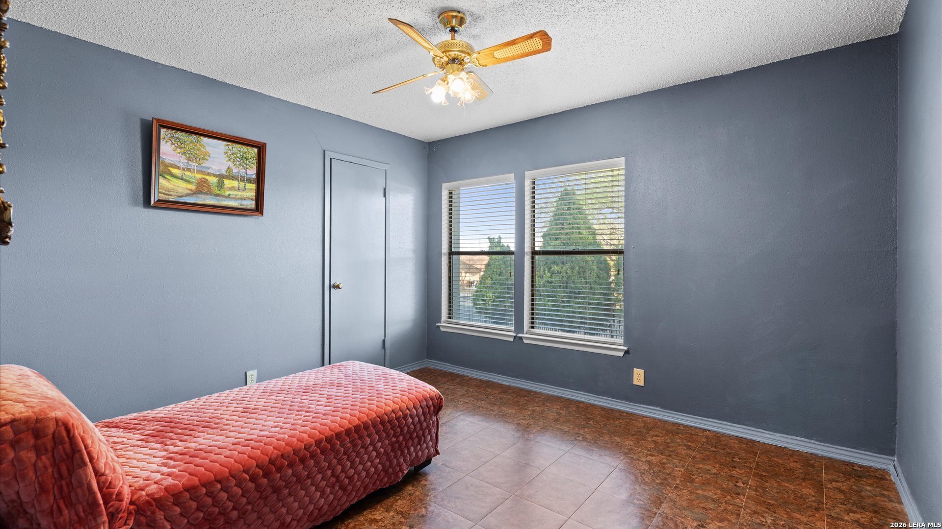 7339 Mystery Ridge Drive Converse, TX 78109 - Photo 16 of 23 a bedroom with a bed and a window