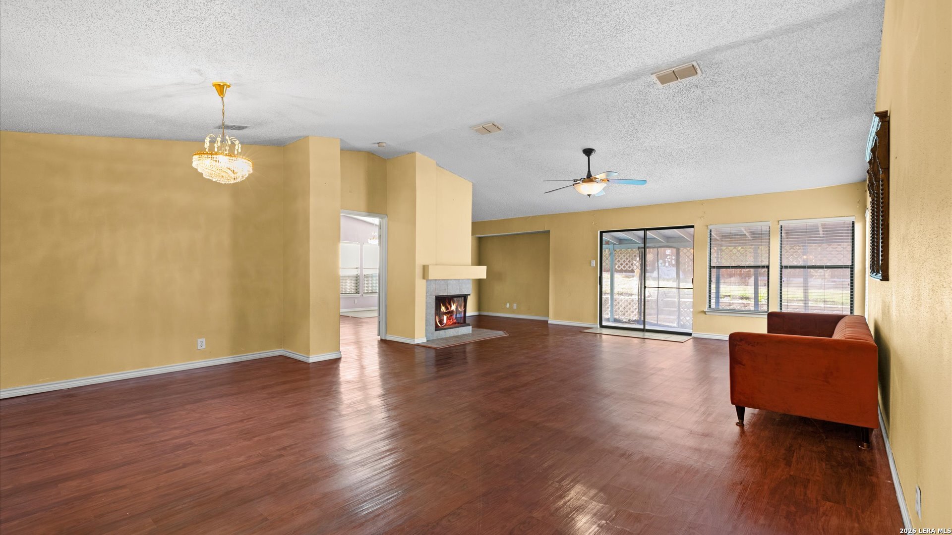 7339 Mystery Ridge Drive Converse, TX 78109 - Photo 4 of 23 a view of livingroom with hardwood floor and a ceiling fan