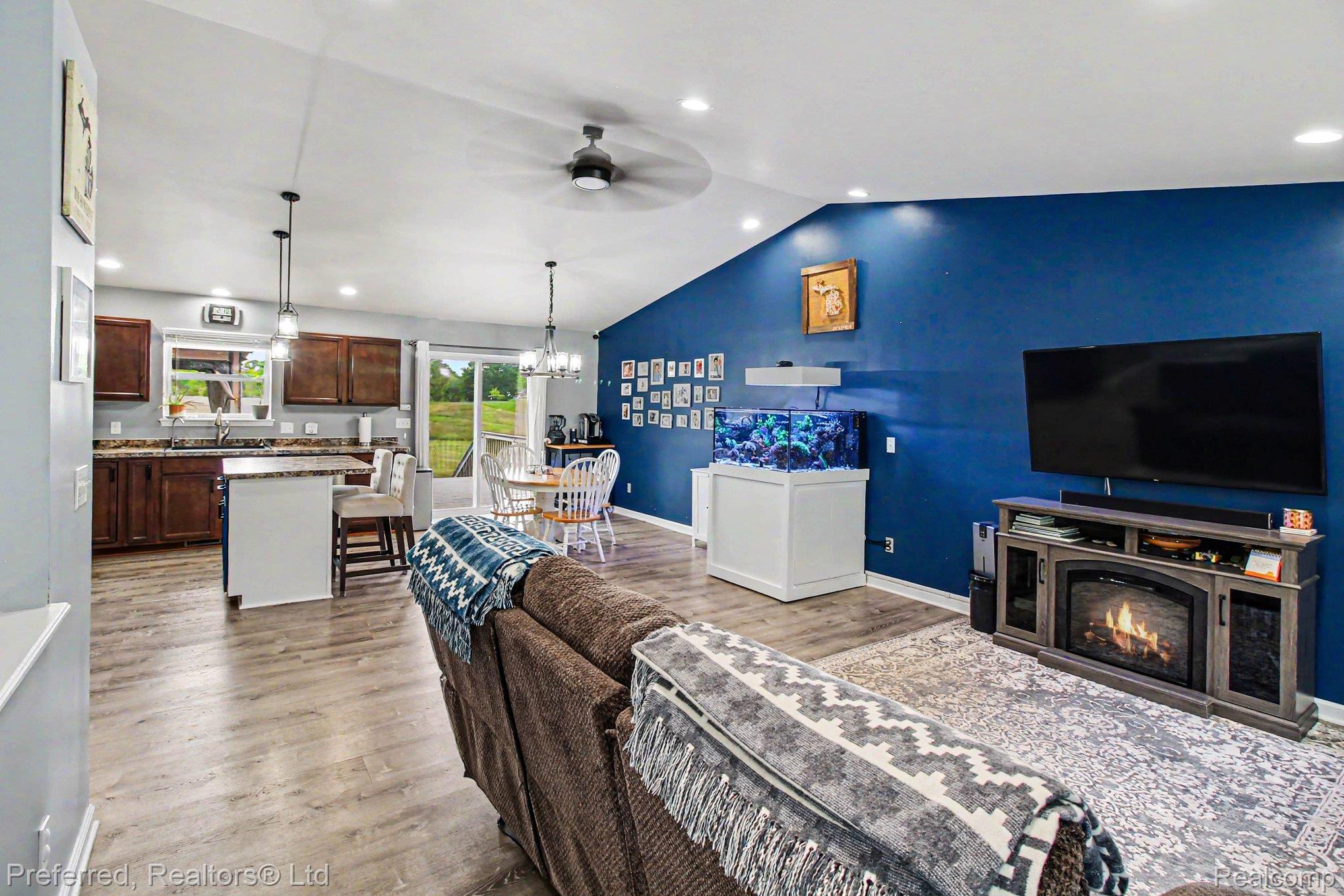 6366 Dutcher Road Howell, MI 48843 - Photo 8 of 33 Vaulted ceilings featuring recessed lighting and a ceiling fan
