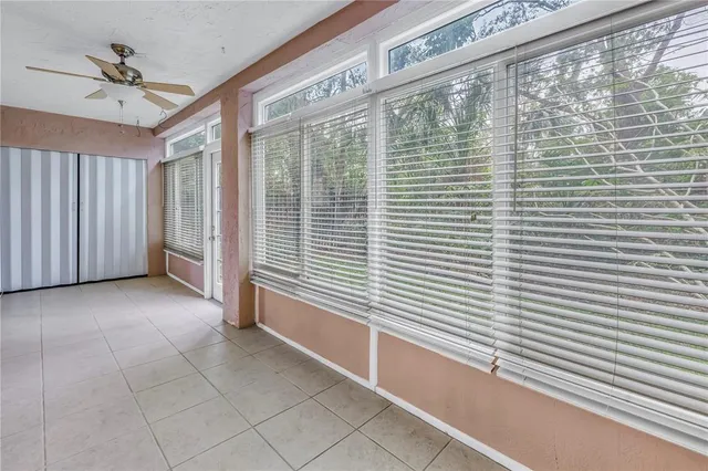 a view of a room with a large window