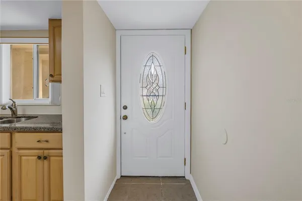 a view of entryway with wooden floor