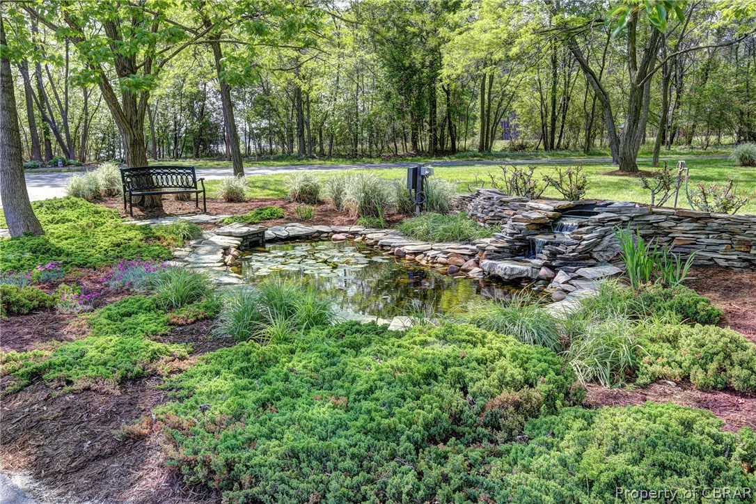 3678 Windmill Point Road White Stone, VA 22578 - Photo 37 of 50 Grounds are richly landscaped with a scenic pond with waterfall