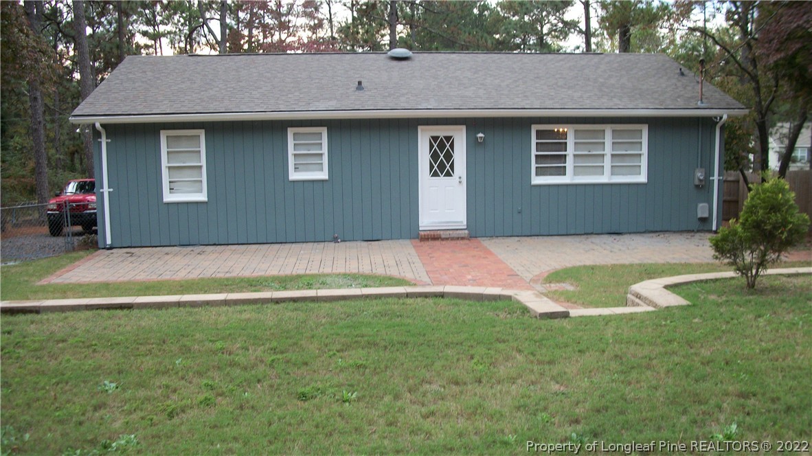 718 North Chapin Road Aberdeen, NC 28315 - Photo 4 of 17 a view of a house with a yard