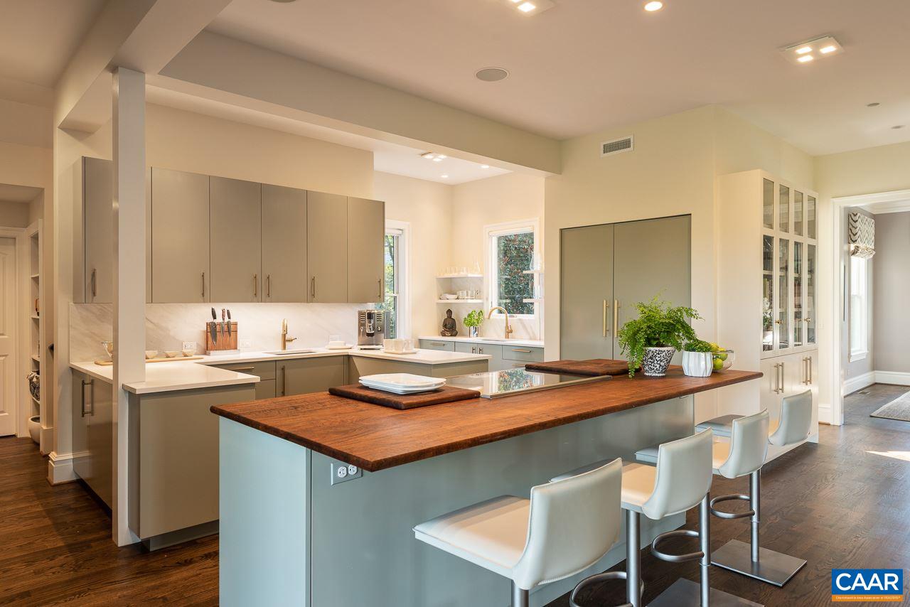 3520 Rocks Mill Lane Charlottesville, VA 22903 - Photo 8 of 50 a kitchen with a sink and chairs