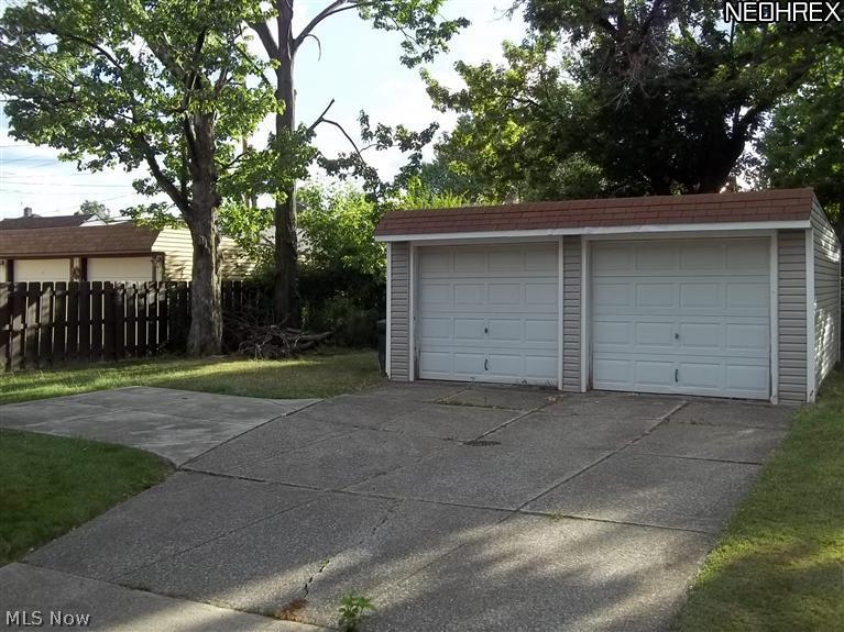 6418-6420 Ridge Road Parma, OH 44129 - Photo 4 of 16 Separate garages and extra pad space. Private yard.