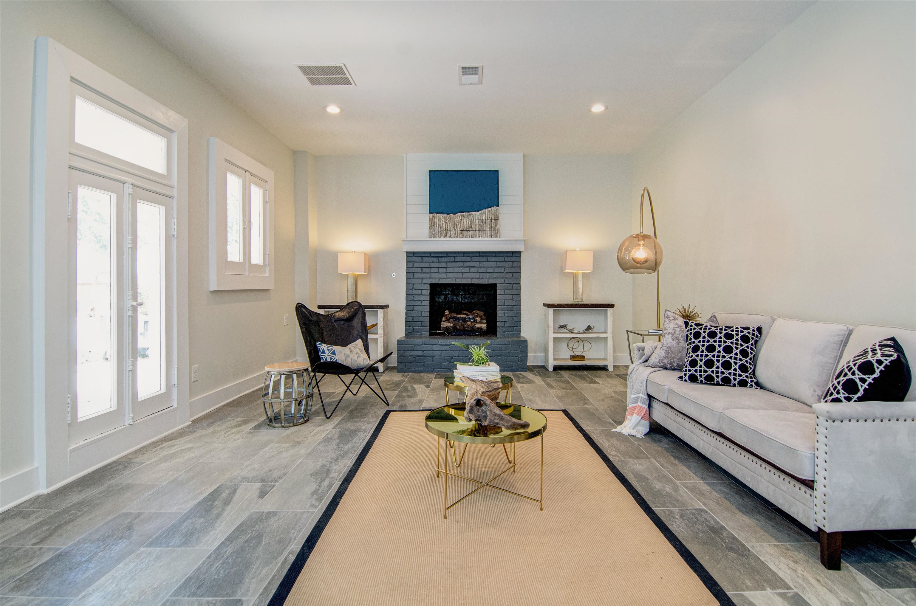 185 Alexander Street Memphis, TN 38111 - Photo 12 of 25 a living room with furniture fireplace and window