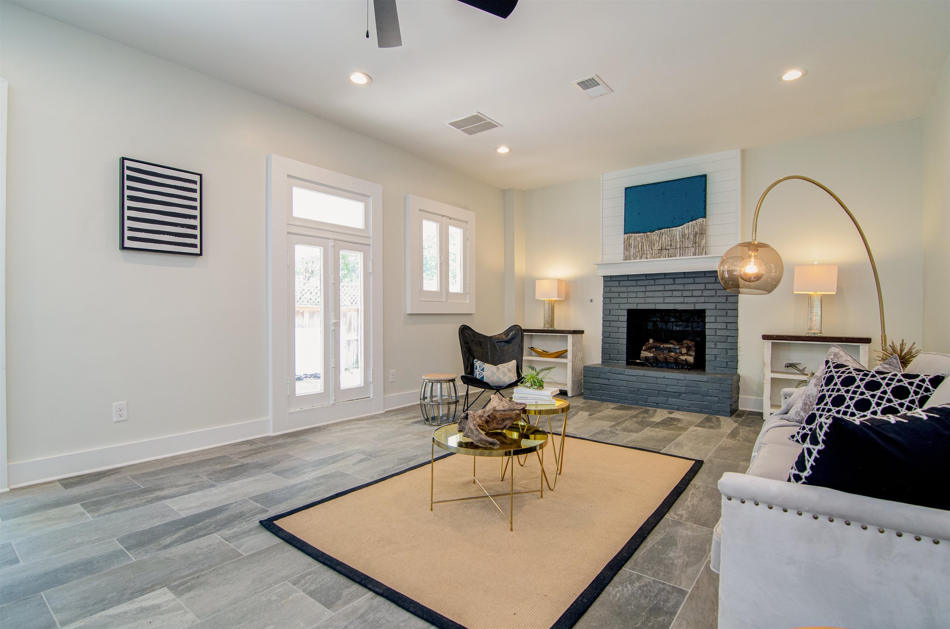 185 Alexander Street Memphis, TN 38111 - Photo 13 of 25 a living room with furniture and a fireplace