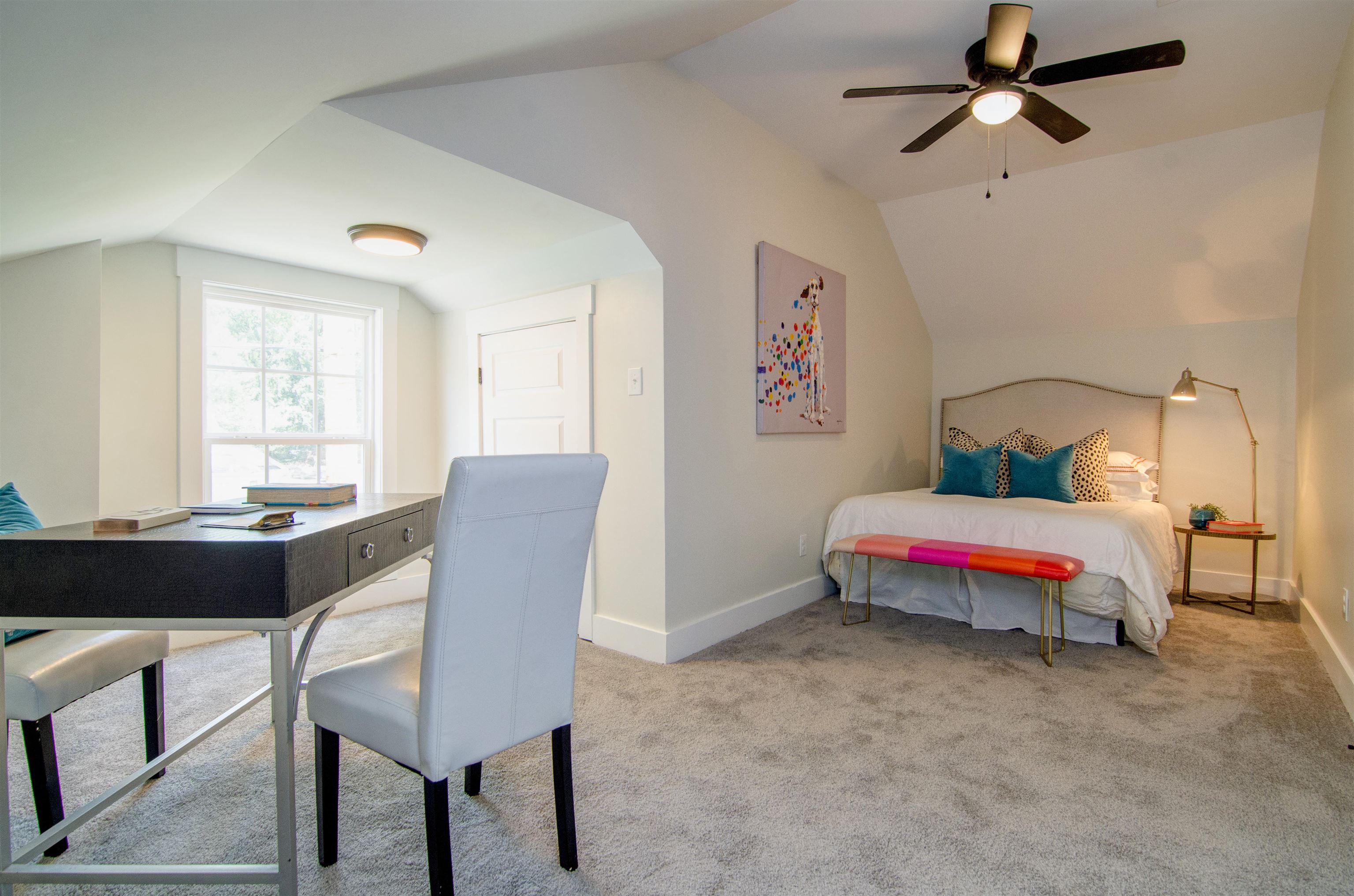 185 Alexander Street Memphis, TN 38111 - Photo 20 of 25 a bedroom with a bed a table and chair