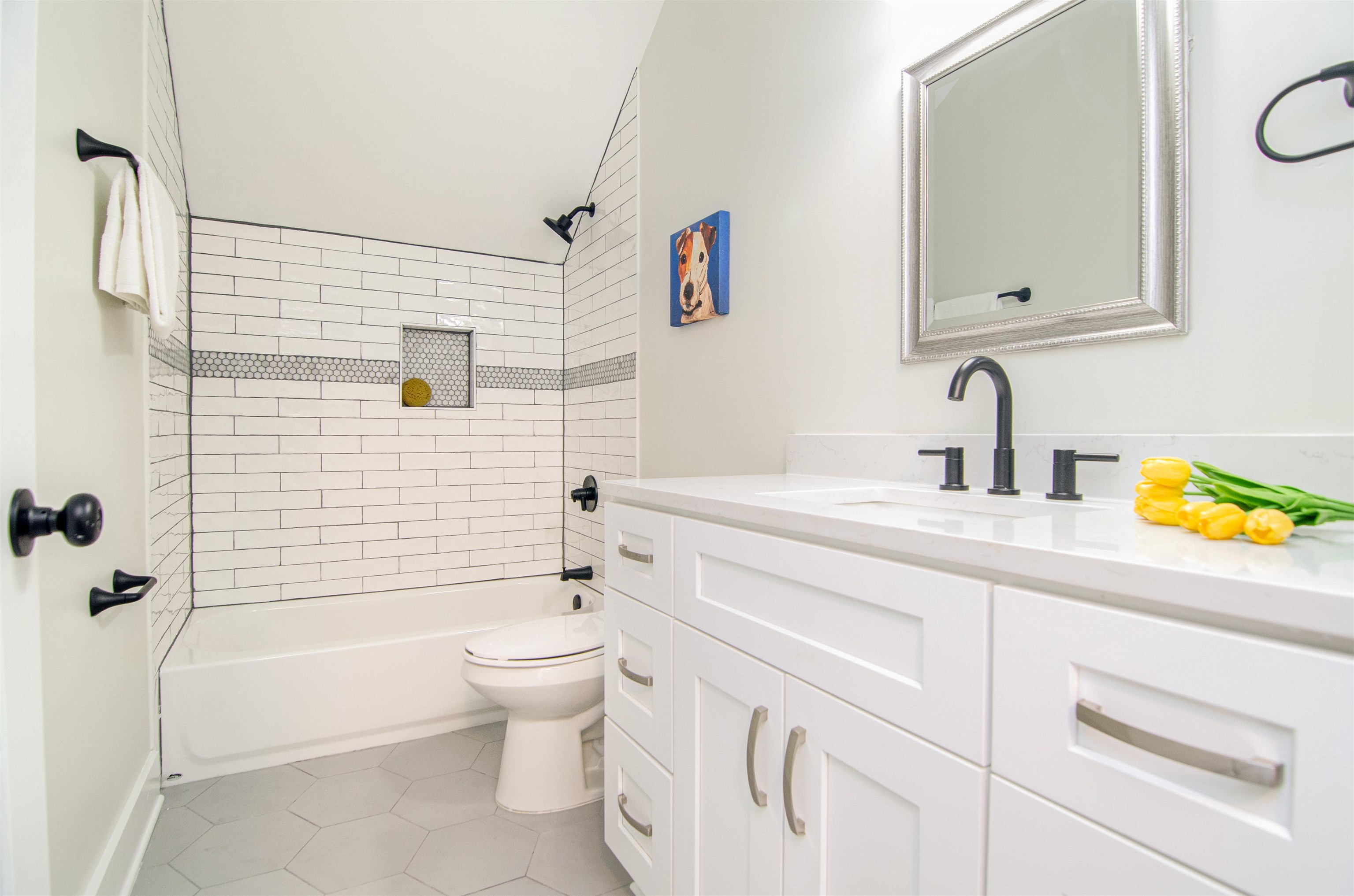 185 Alexander Street Memphis, TN 38111 - Photo 21 of 25 a bathroom with a sink a toilet and shower