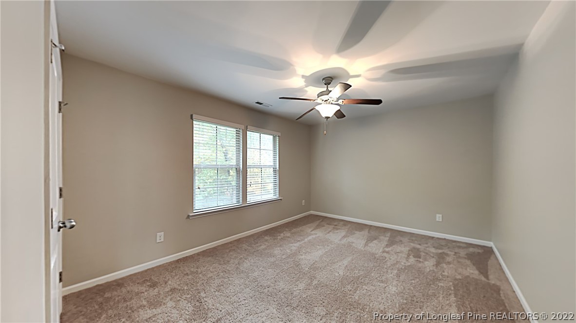271 River Oak Street Spring Lake, NC 28390 - Photo 11 of 18 a view of an empty room with a window